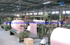 Rubberized dipped polyester poly spun tire cord fabric
